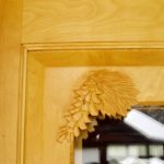 Pine cone carving on maple