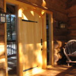 Alaskan Yellow Ceda plank door in log home