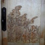 wildflower door carving on curly Maple panel